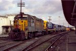 CSX 2645 and other locos are tied down on a train in the yard